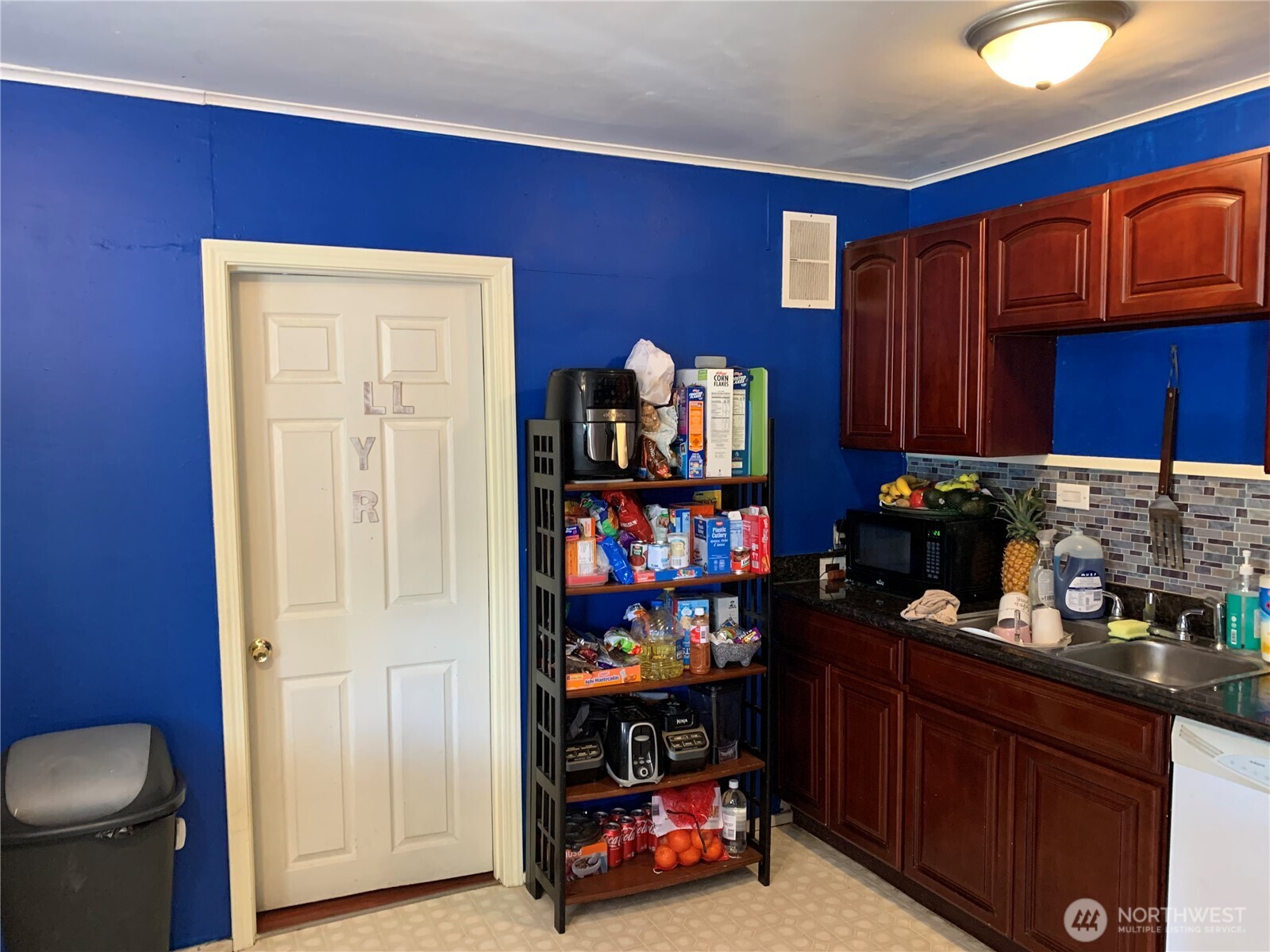 632 Index Avenue Northeast Renton, WA 98056 - Photo 7 of 13 a bedroom with furniture and cabinets