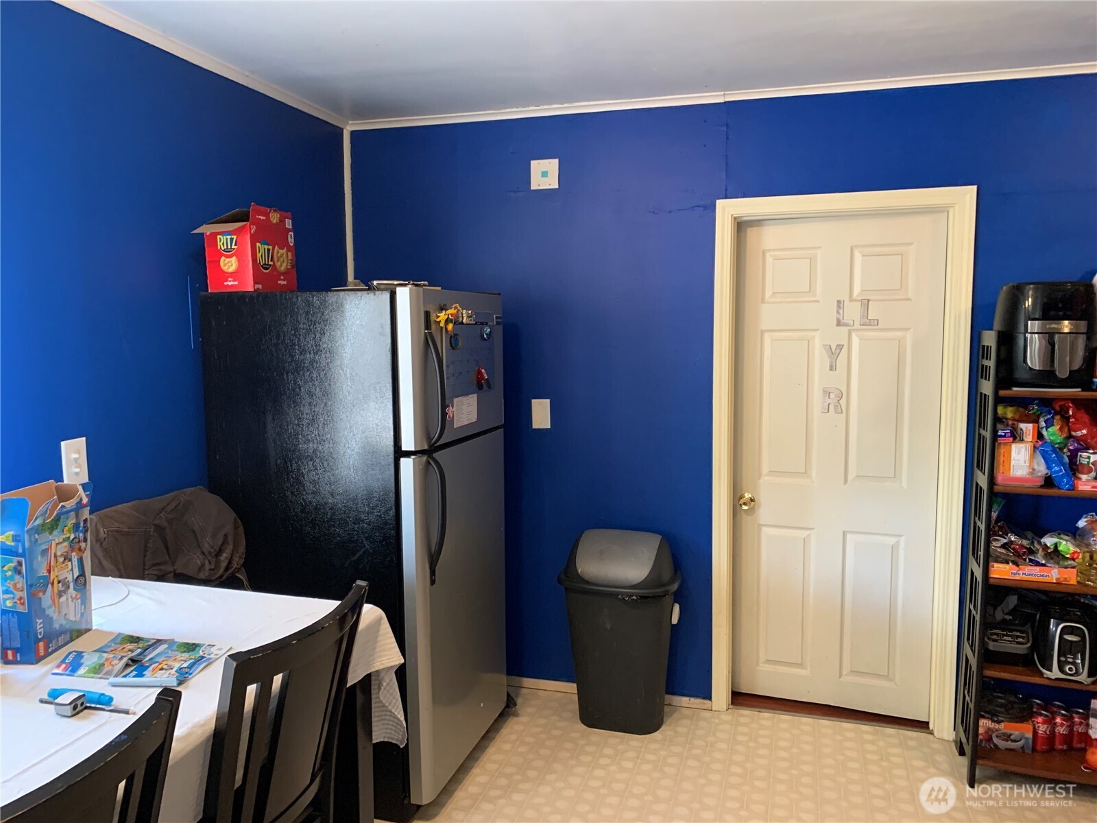 632 Index Avenue Northeast Renton, WA 98056 - Photo 8 of 13 a refrigerator freezer sitting in a kitchen