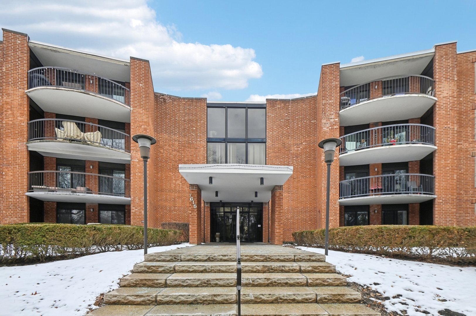 1615 East Central Road, Unit 121C Arlington Heights, IL 60005 - Photo 1 of 23 a front view of a building
