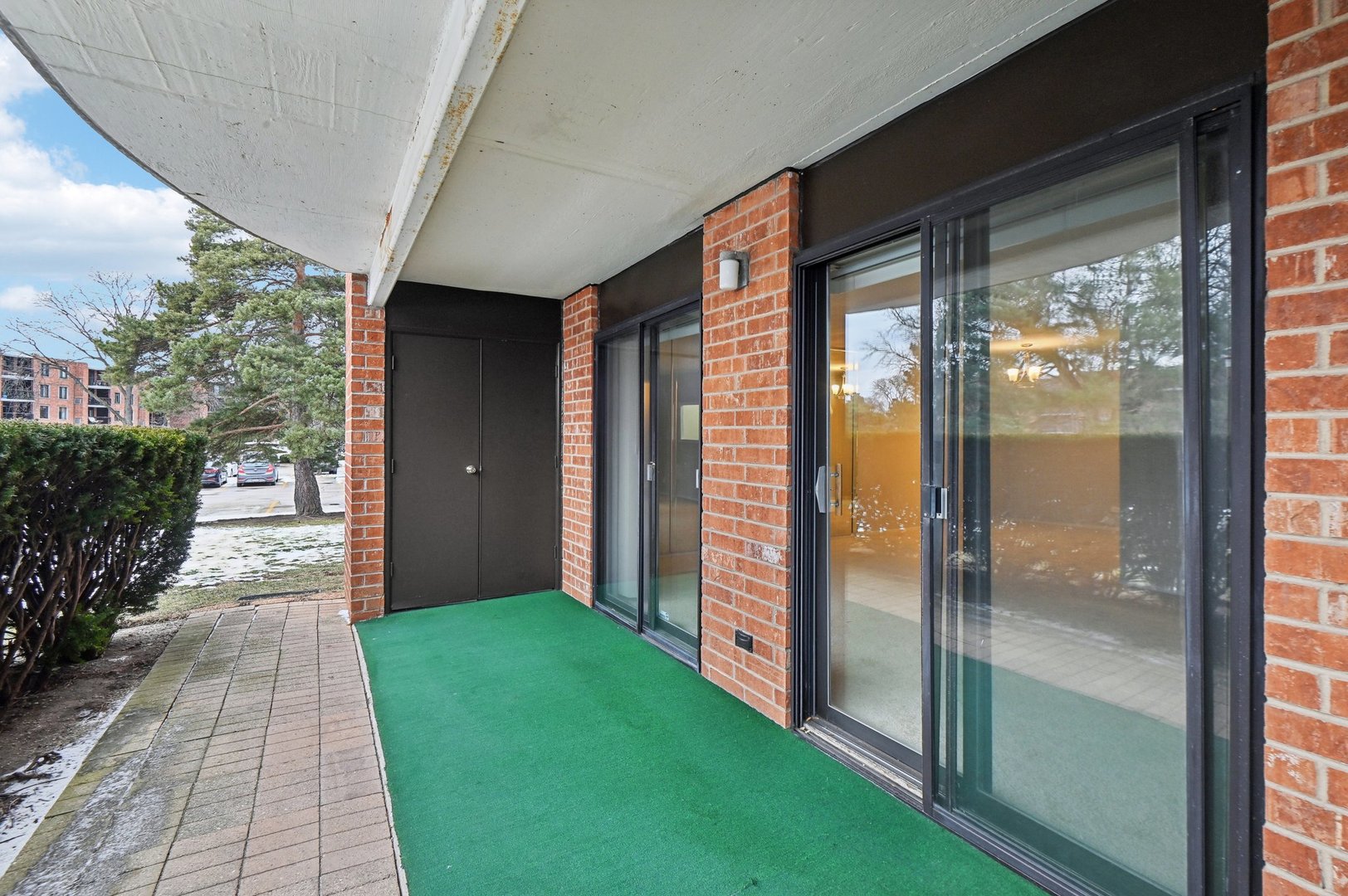 1615 East Central Road, Unit 121C Arlington Heights, IL 60005 - Photo 21 of 23 a view of a porch