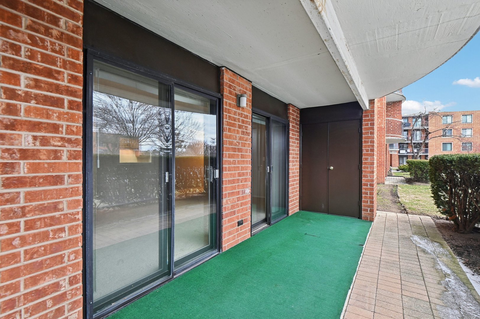 1615 East Central Road, Unit 121C Arlington Heights, IL 60005 - Photo 22 of 23 a balcony with view of outdoor space