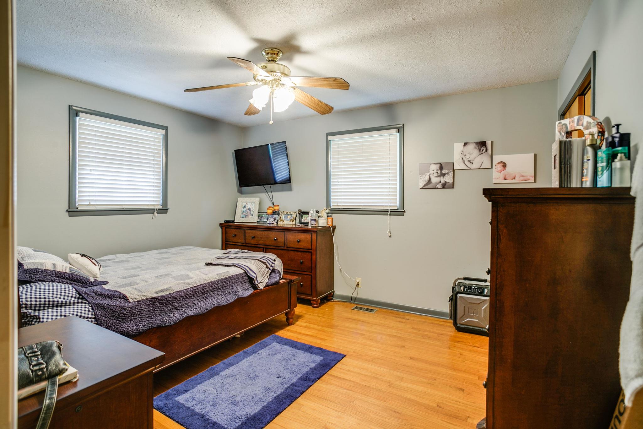 2818 Ewell Elliott Road Springfield, TN 37172 - Photo 14 of 24 a bedroom with a bed and flat screen tv