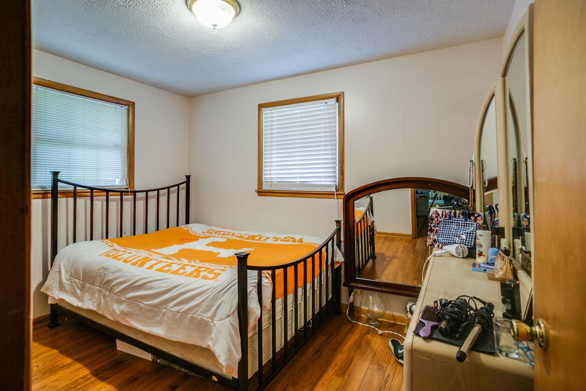 2818 Ewell Elliott Road Springfield, TN 37172 - Photo 15 of 24 a bedroom with a bed and a large window