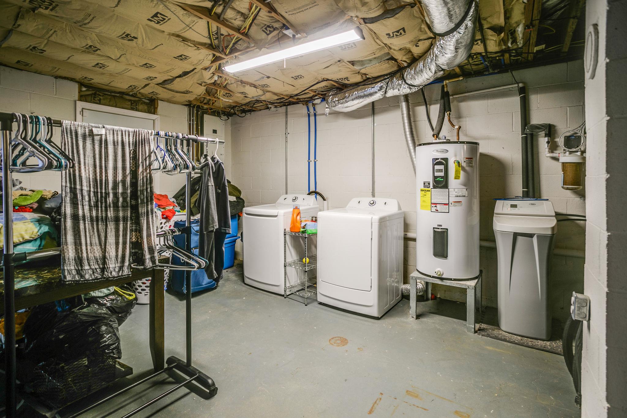 2818 Ewell Elliott Road Springfield, TN 37172 - Photo 22 of 24 a view of a storage room with a lot of stuff