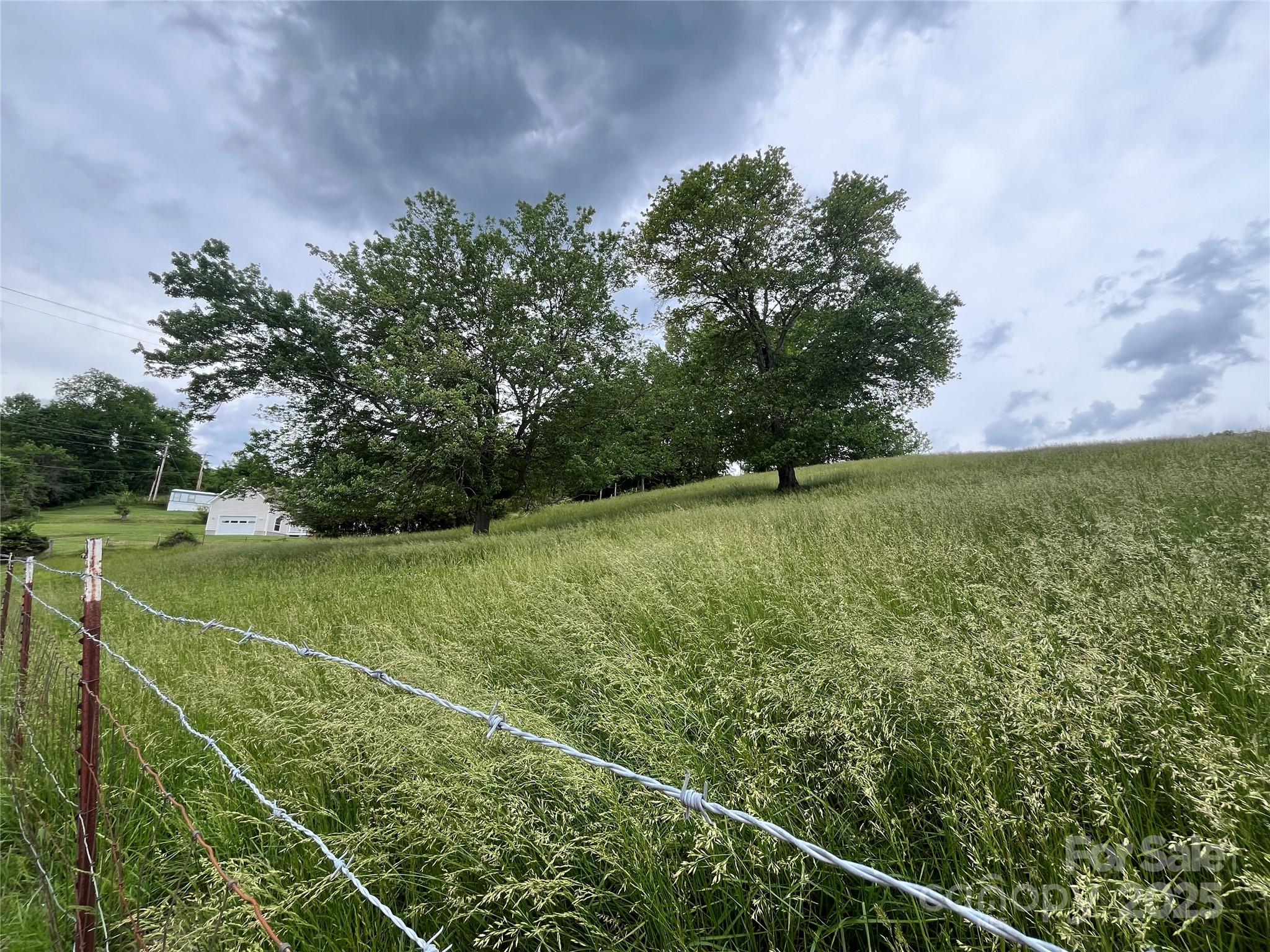 Tbd Hyder Mountain Road Clyde, NC 28721 - Photo 1 of 9 a view of a field with an outdoor space