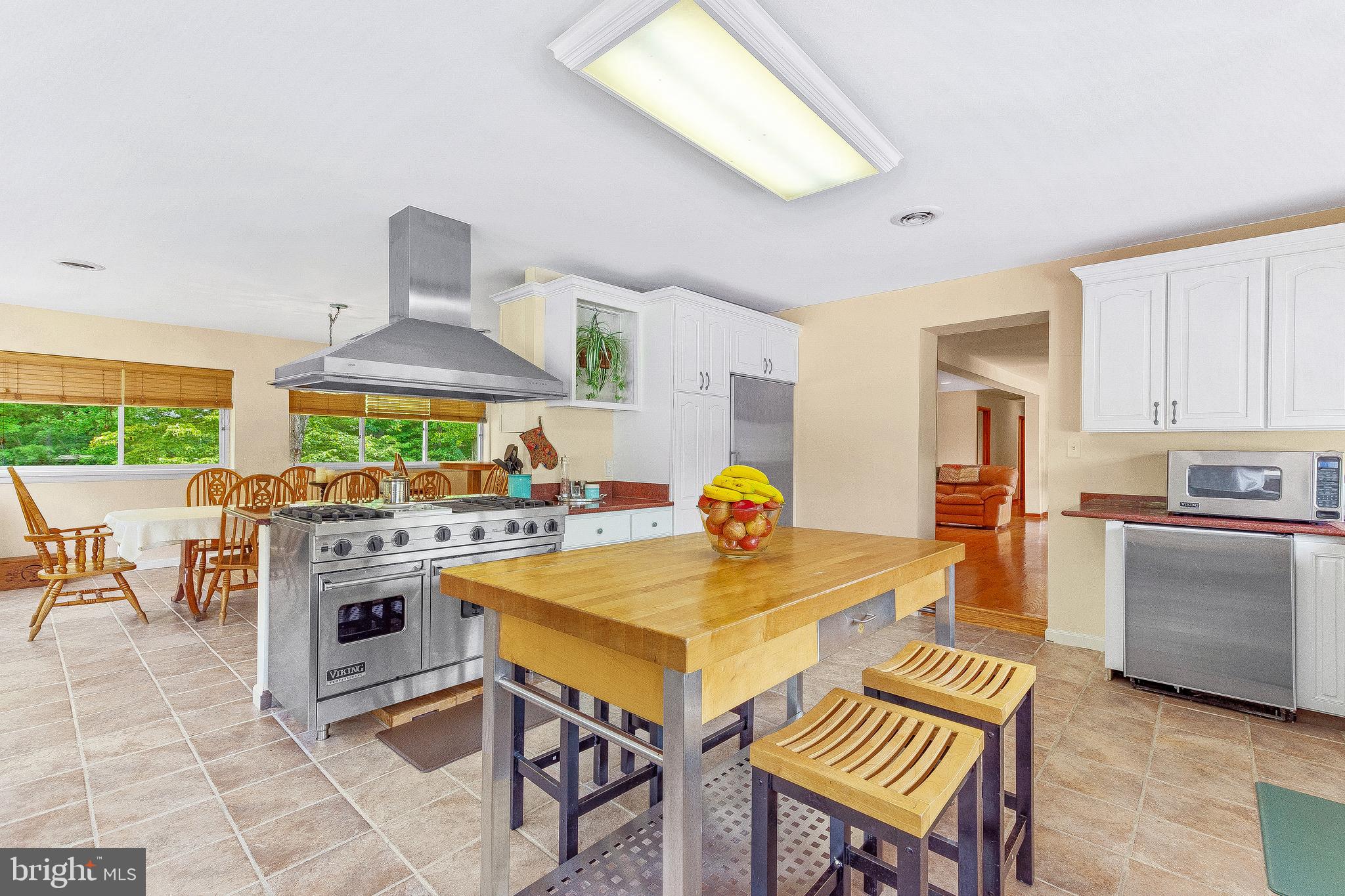 1070 Clay Hammond Road Prince Frederick, MD 20678 - Photo 20 of 81 Kitchen Opens to a Large Dining Room