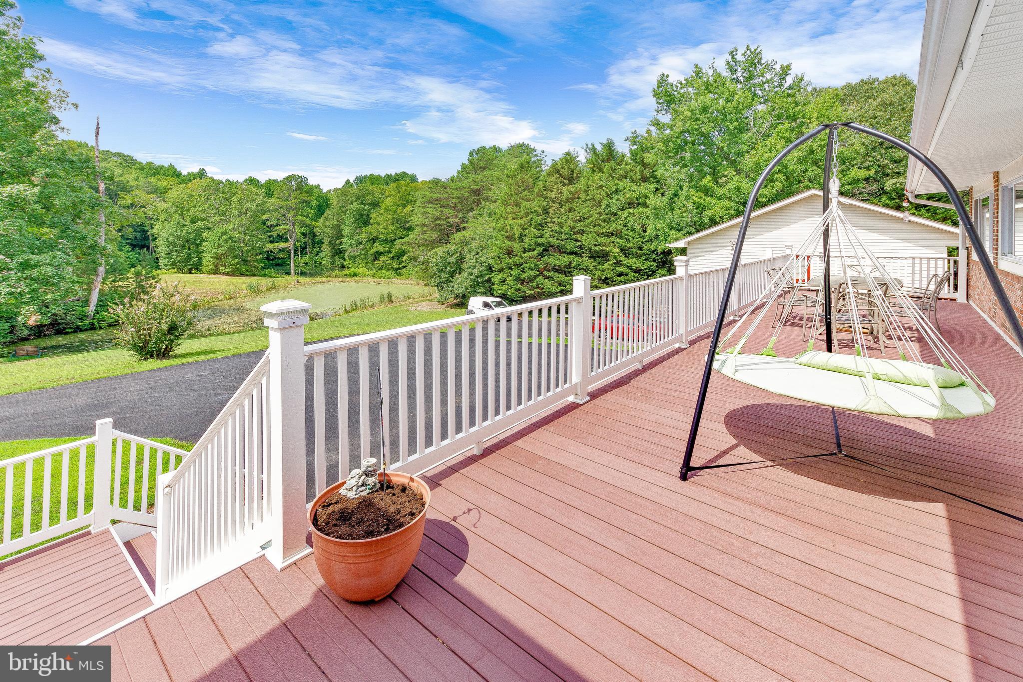 1070 Clay Hammond Road Prince Frederick, MD 20678 - Photo 61 of 81 deck runs entire lengthof house!