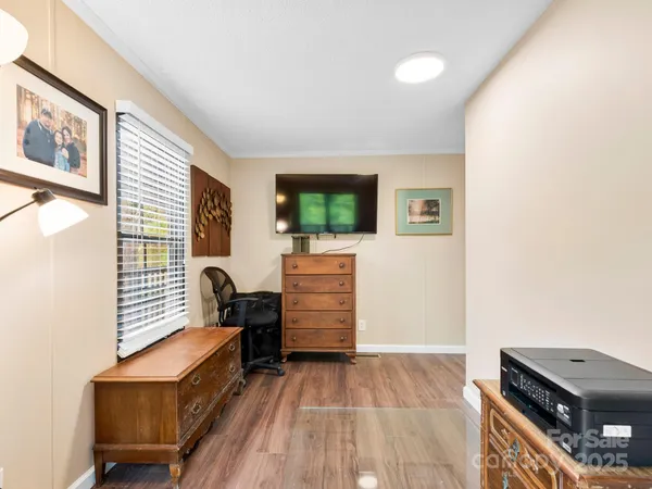 a view of a livingroom with furniture
