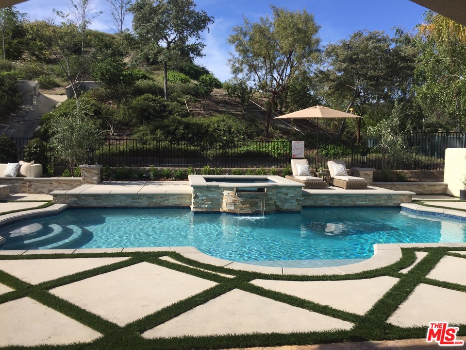 26810 Kendall Lane Stevenson Ranch, CA 91381 - Photo 2 of 44 an outdoor space with swimming pool and furniture
