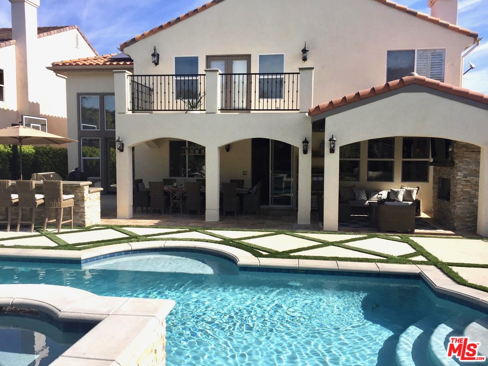 26810 Kendall Lane Stevenson Ranch, CA 91381 - Photo 3 of 44 a view of a building with a patio