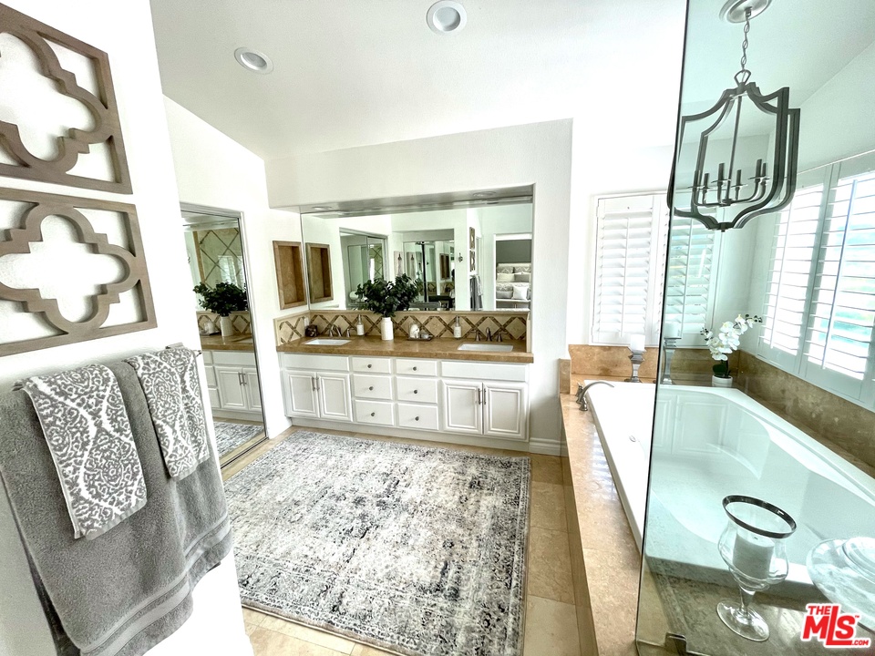 26810 Kendall Lane Stevenson Ranch, CA 91381 - Photo 27 of 44 a living room with furniture and a large window