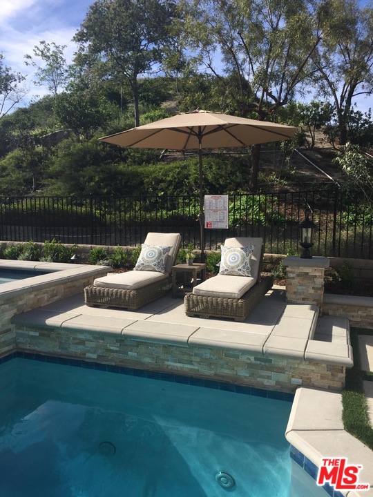 26810 Kendall Lane Stevenson Ranch, CA 91381 - Photo 4 of 44 a view of pool with outdoor seating