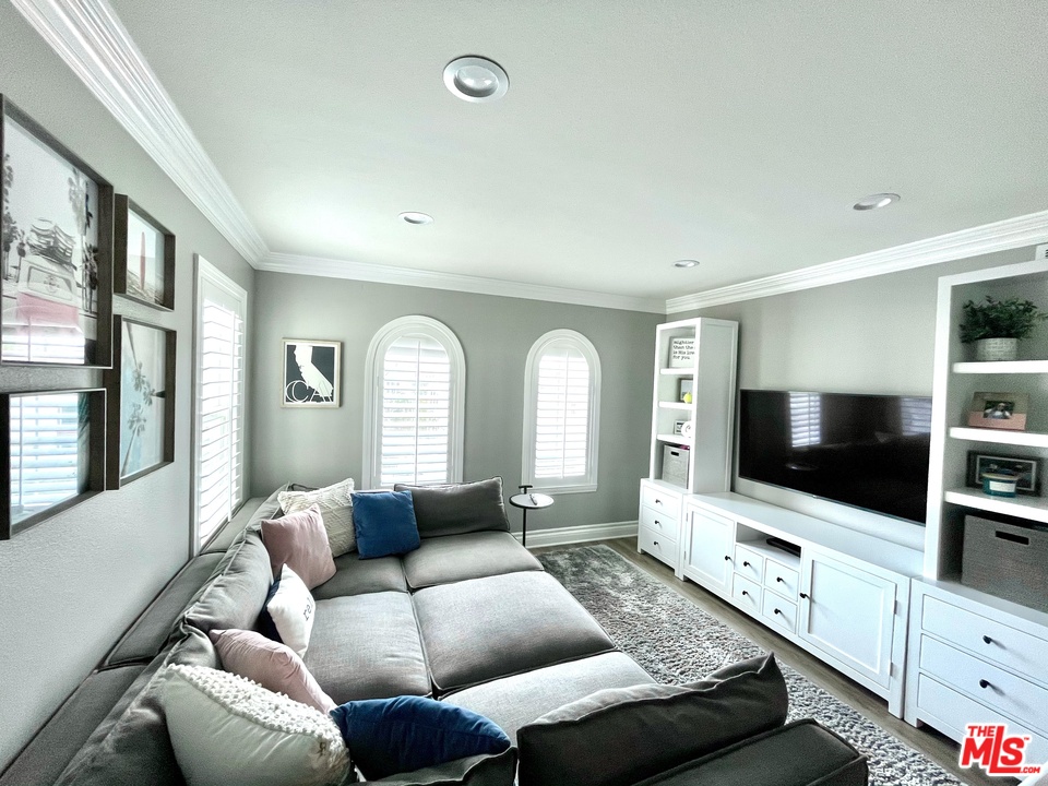 26810 Kendall Lane Stevenson Ranch, CA 91381 - Photo 34 of 44 a living room with furniture and a flat screen tv