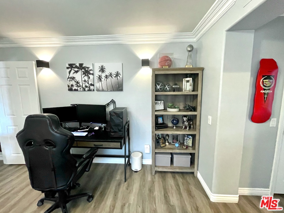 26810 Kendall Lane Stevenson Ranch, CA 91381 - Photo 38 of 44 a view of a workspace with furniture and wooden floor