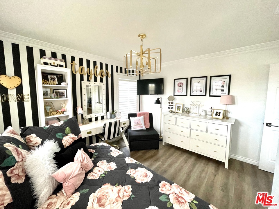 26810 Kendall Lane Stevenson Ranch, CA 91381 - Photo 42 of 44 a bedroom with furniture and wooden floor