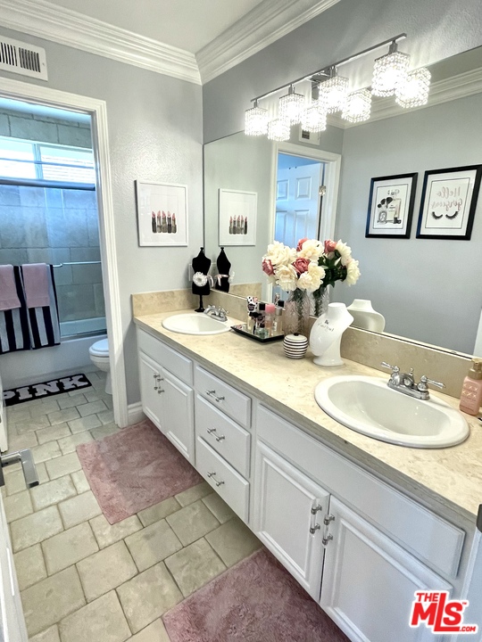 26810 Kendall Lane Stevenson Ranch, CA 91381 - Photo 43 of 44 a spacious bathroom with a double vanity sink mirror and