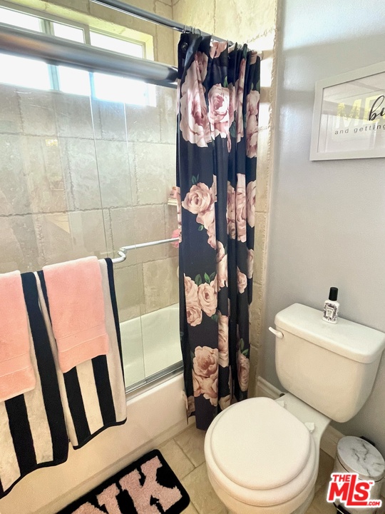 26810 Kendall Lane Stevenson Ranch, CA 91381 - Photo 44 of 44 a white toilet sitting next to a bathroom sink