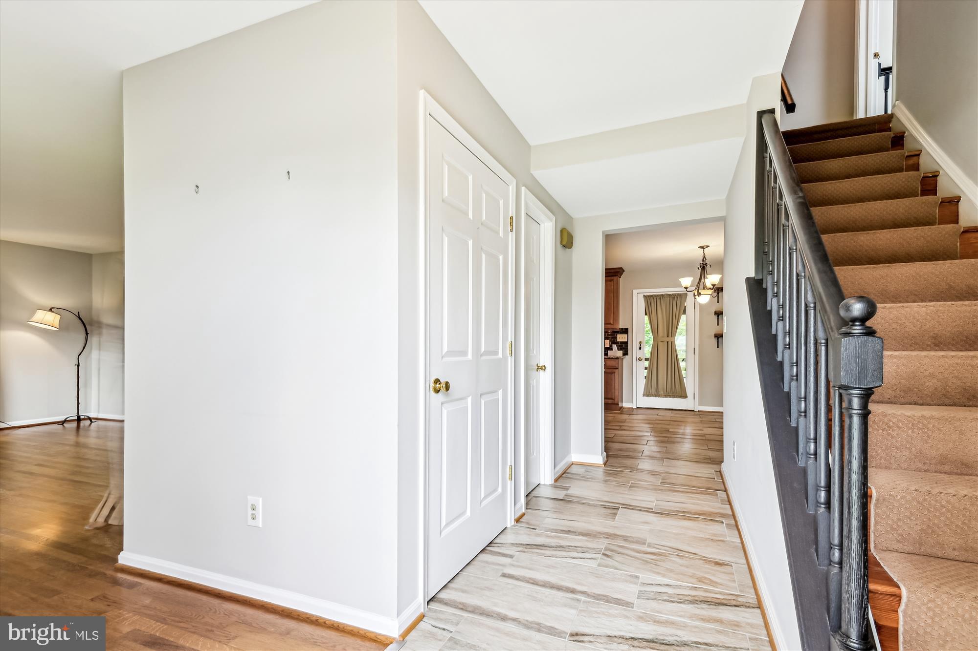 1302 Terry Way Fallston, MD 21047 - Photo 12 of 51 a view of a hallway with wooden floor and staircase