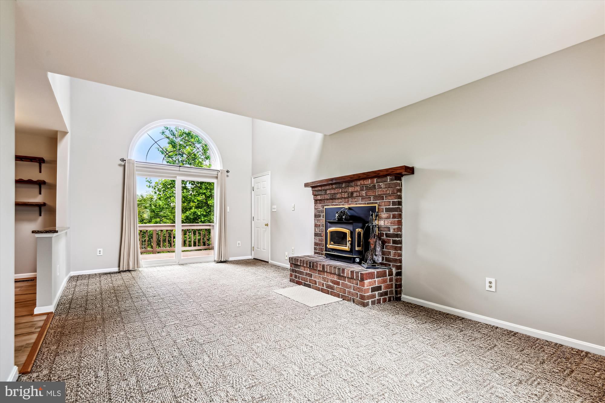 1302 Terry Way Fallston, MD 21047 - Photo 19 of 51 an empty room with furniture and a fireplace