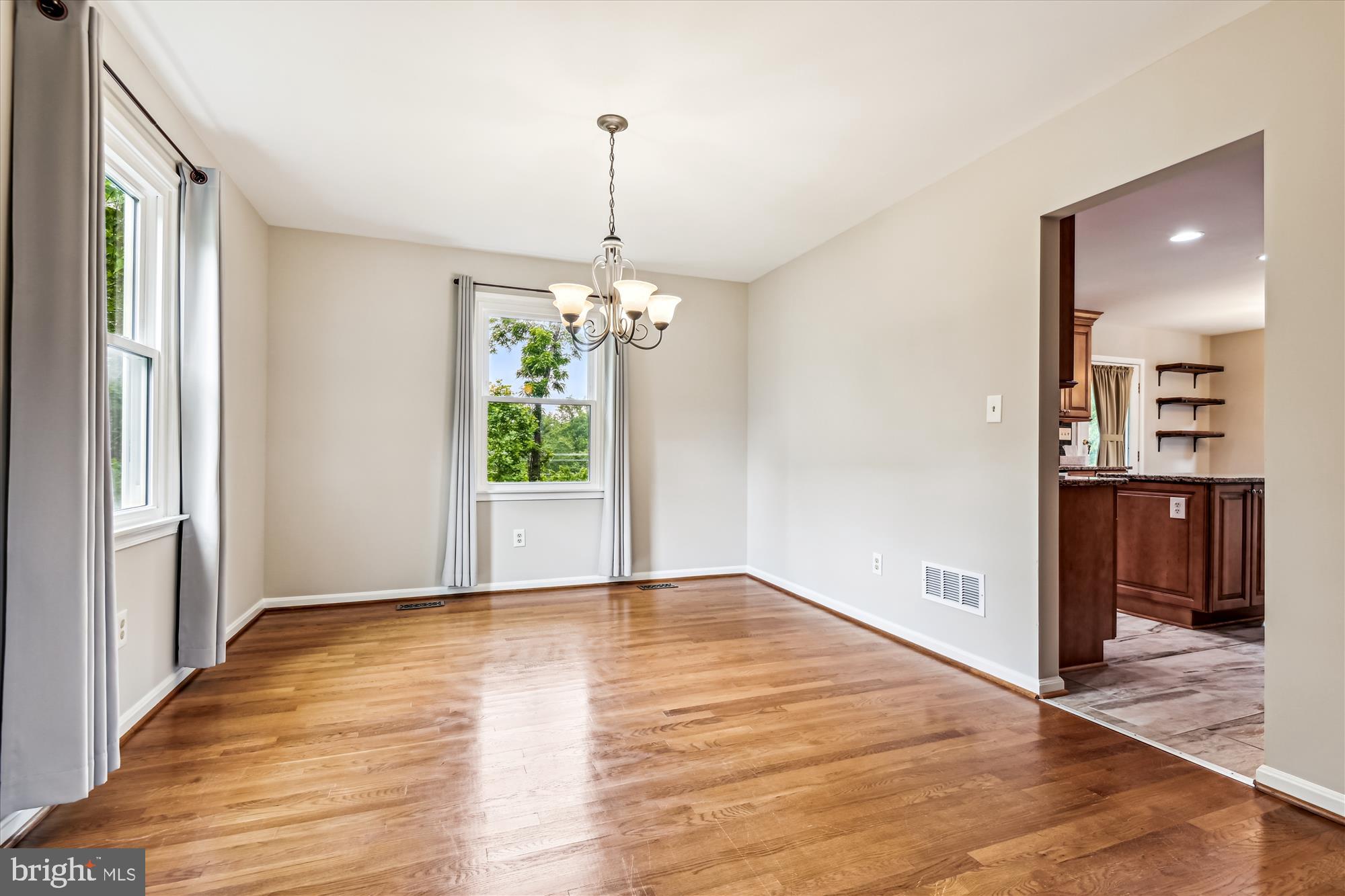 1302 Terry Way Fallston, MD 21047 - Photo 23 of 51 a view of an empty room with window and wooden floor