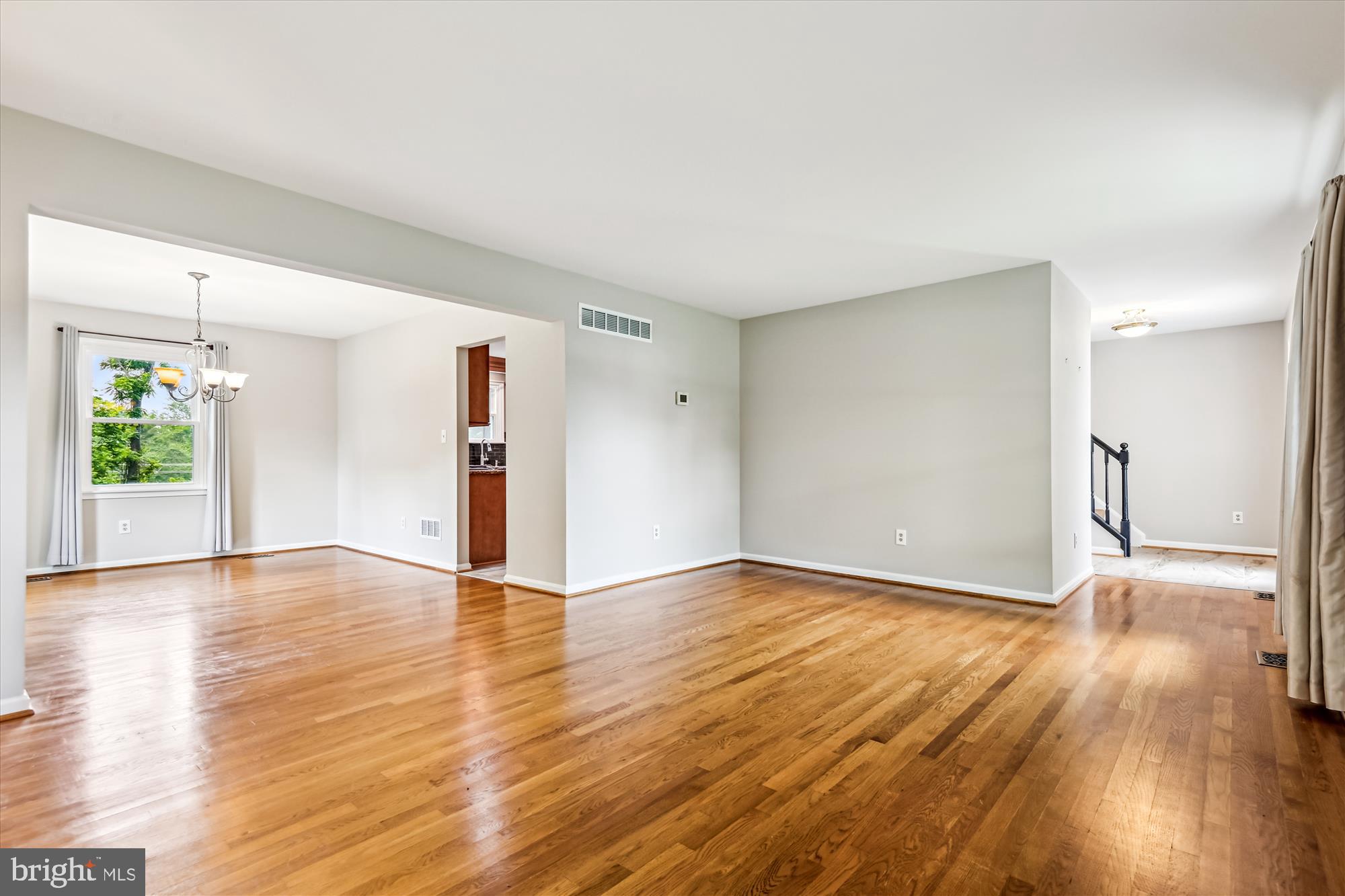 1302 Terry Way Fallston, MD 21047 - Photo 25 of 51 a view of an empty room with wooden floor and a window