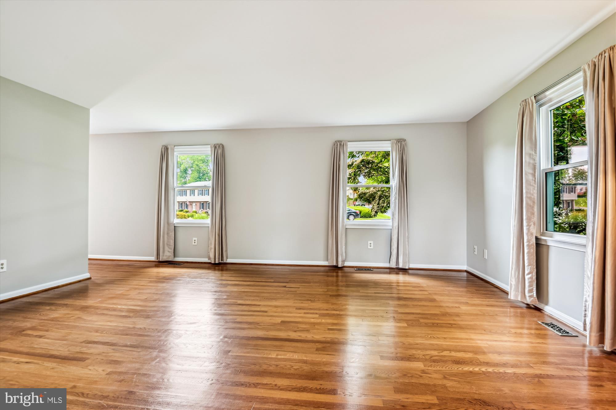 1302 Terry Way Fallston, MD 21047 - Photo 26 of 51 a view of an empty room with window and wooden floor