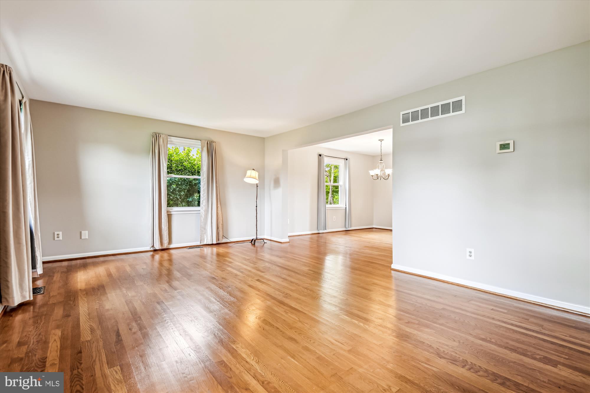 1302 Terry Way Fallston, MD 21047 - Photo 27 of 51 a view of an empty room with wooden floor and a window