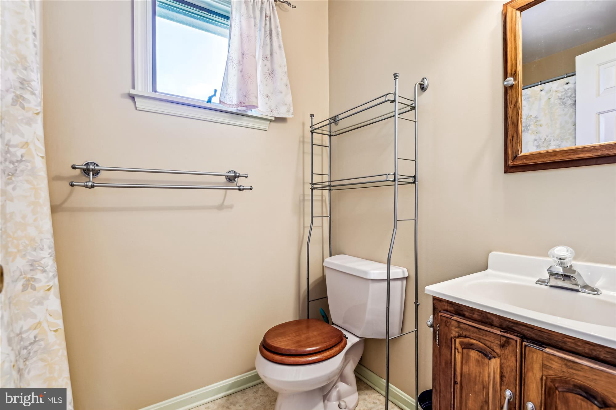 1302 Terry Way Fallston, MD 21047 - Photo 40 of 51 a bathroom with a toilet and a sink