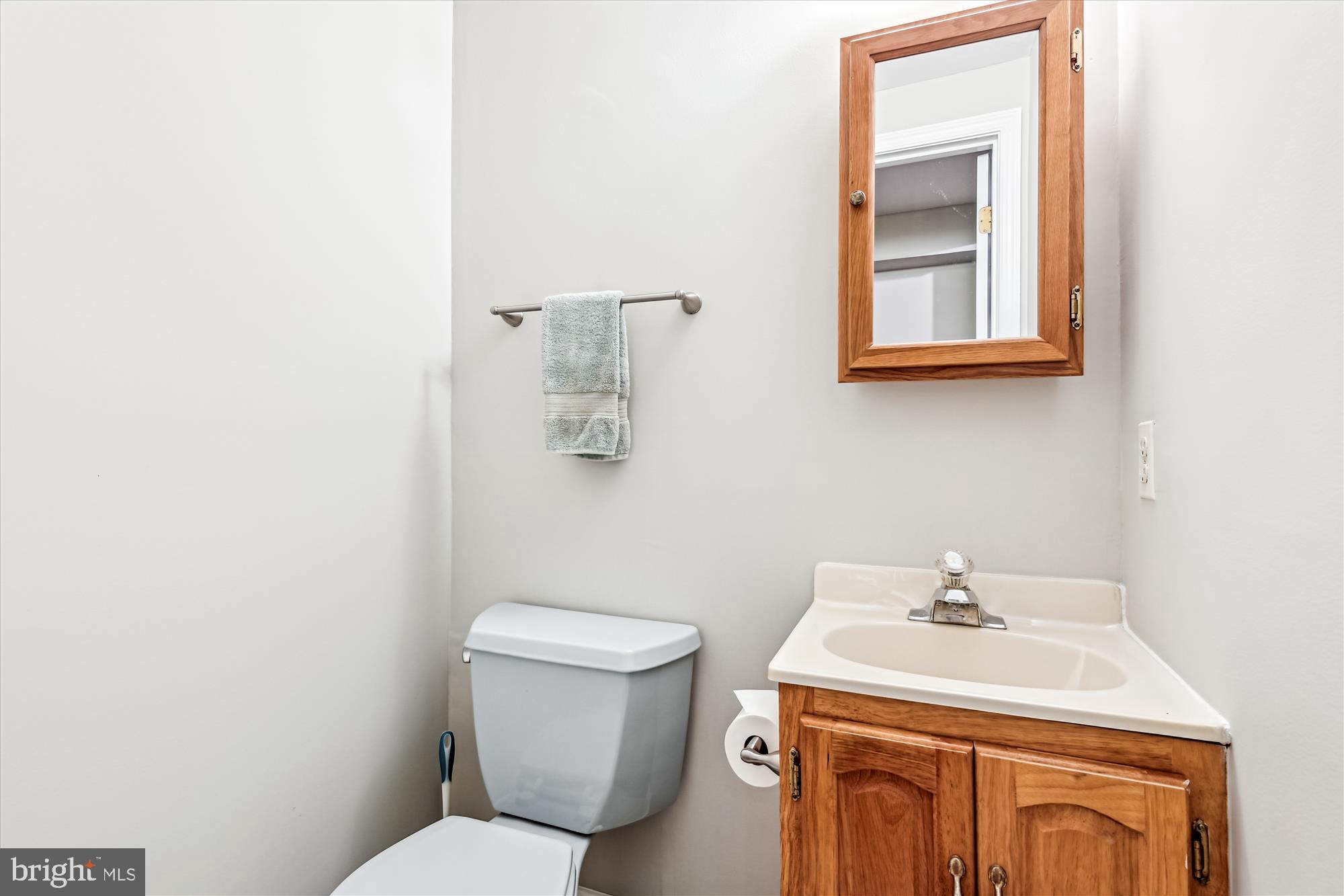 1302 Terry Way Fallston, MD 21047 - Photo 50 of 51 a bathroom with a sink a toilet and mirror