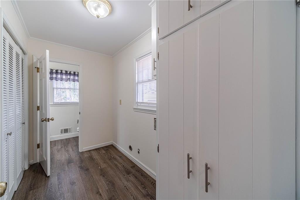 492 New Hope Road Lawrenceville, GA 30046 - Photo 15 of 48 a view of room with window and wooden floor