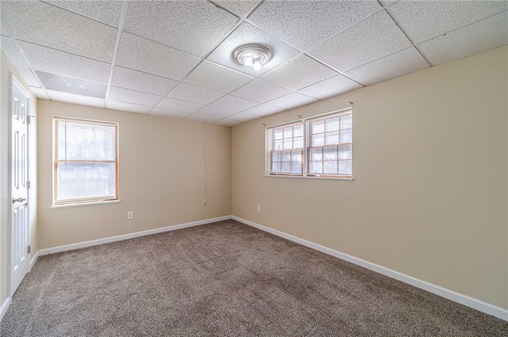 492 New Hope Road Lawrenceville, GA 30046 - Photo 35 of 48 an empty room with windows