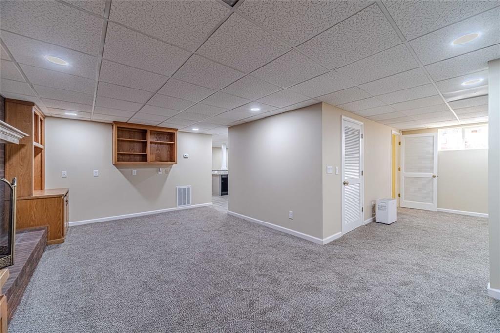 492 New Hope Road Lawrenceville, GA 30046 - Photo 38 of 48 a view of a livingroom with an empty space