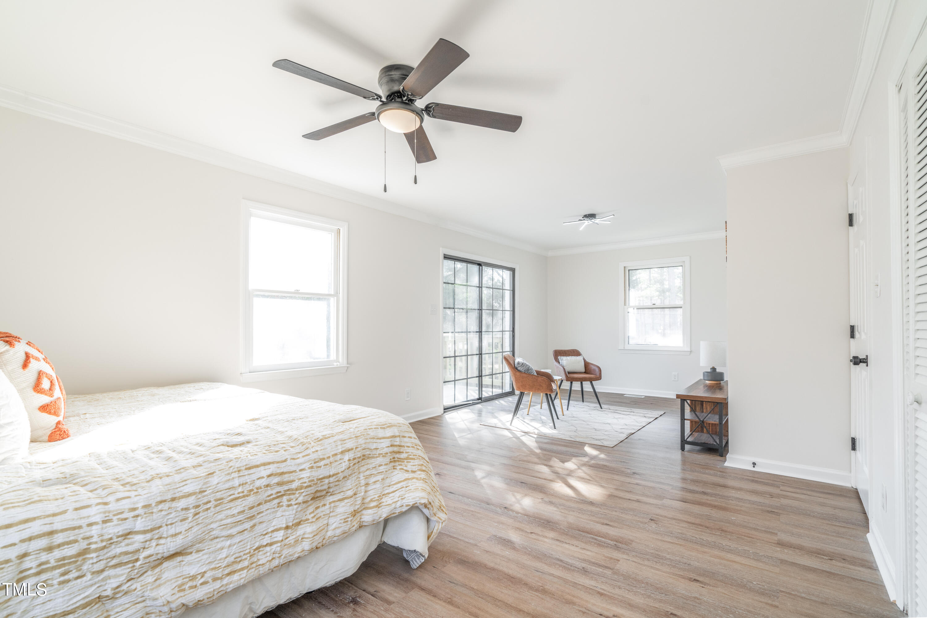 5017 Robinwood Road Durham, NC 27713 - Photo 16 of 45 a bedroom with a bed furniture and a window