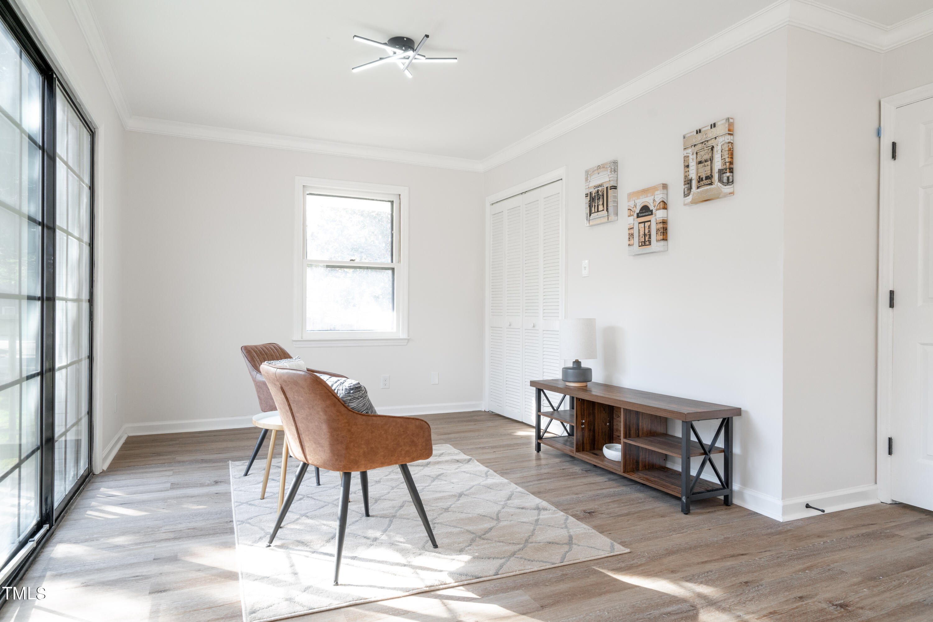 5017 Robinwood Road Durham, NC 27713 - Photo 22 of 45 a living room with furniture and a window