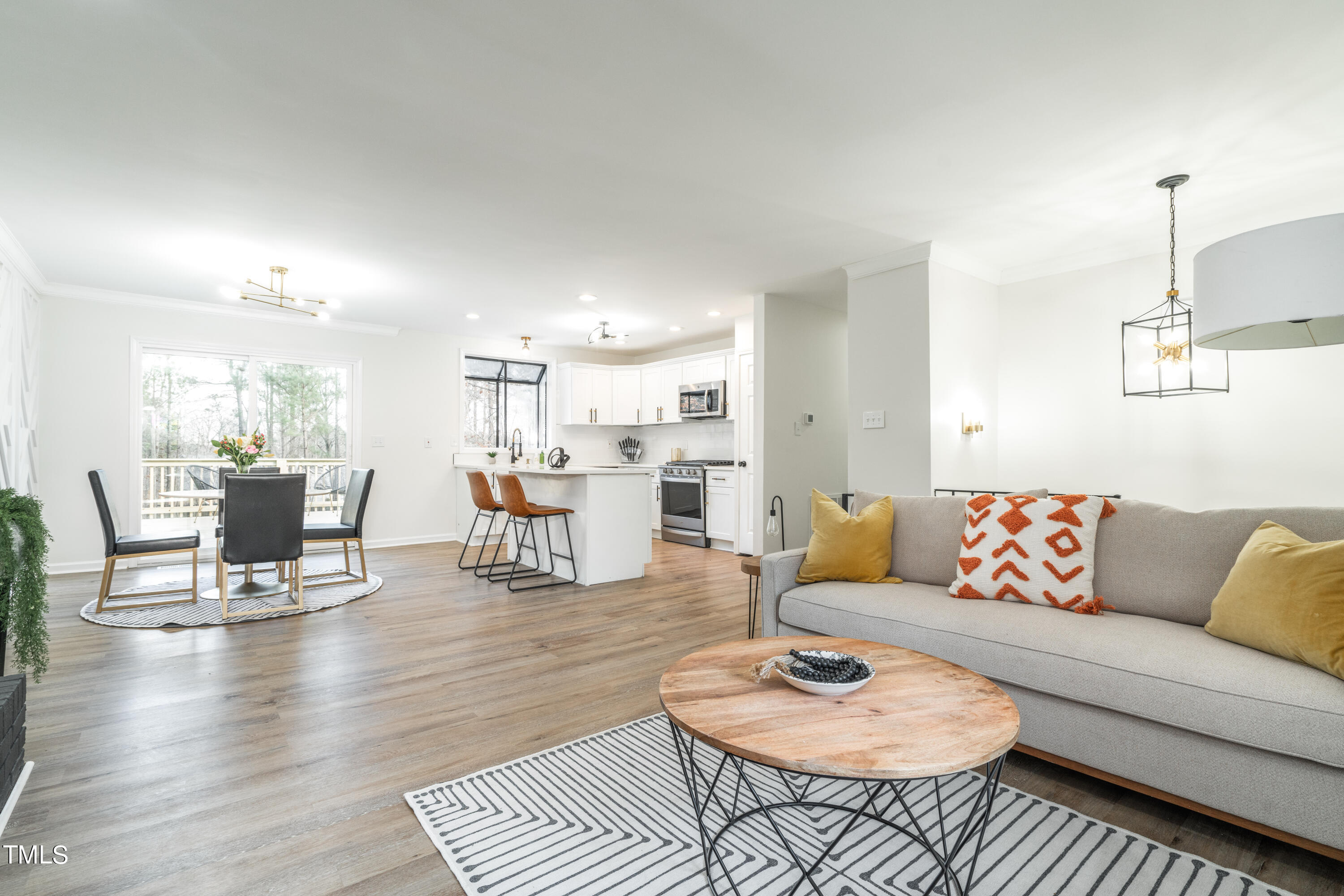 5017 Robinwood Road Durham, NC 27713 - Photo 7 of 45 a living room with furniture and wooden floor