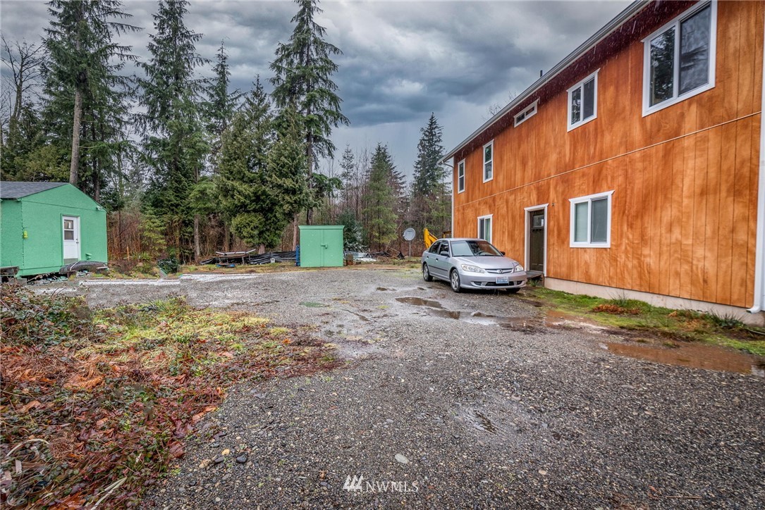 8327 Custer School Road Custer, WA 98240 - Photo 5 of 30 a backyard of a house with a parked car