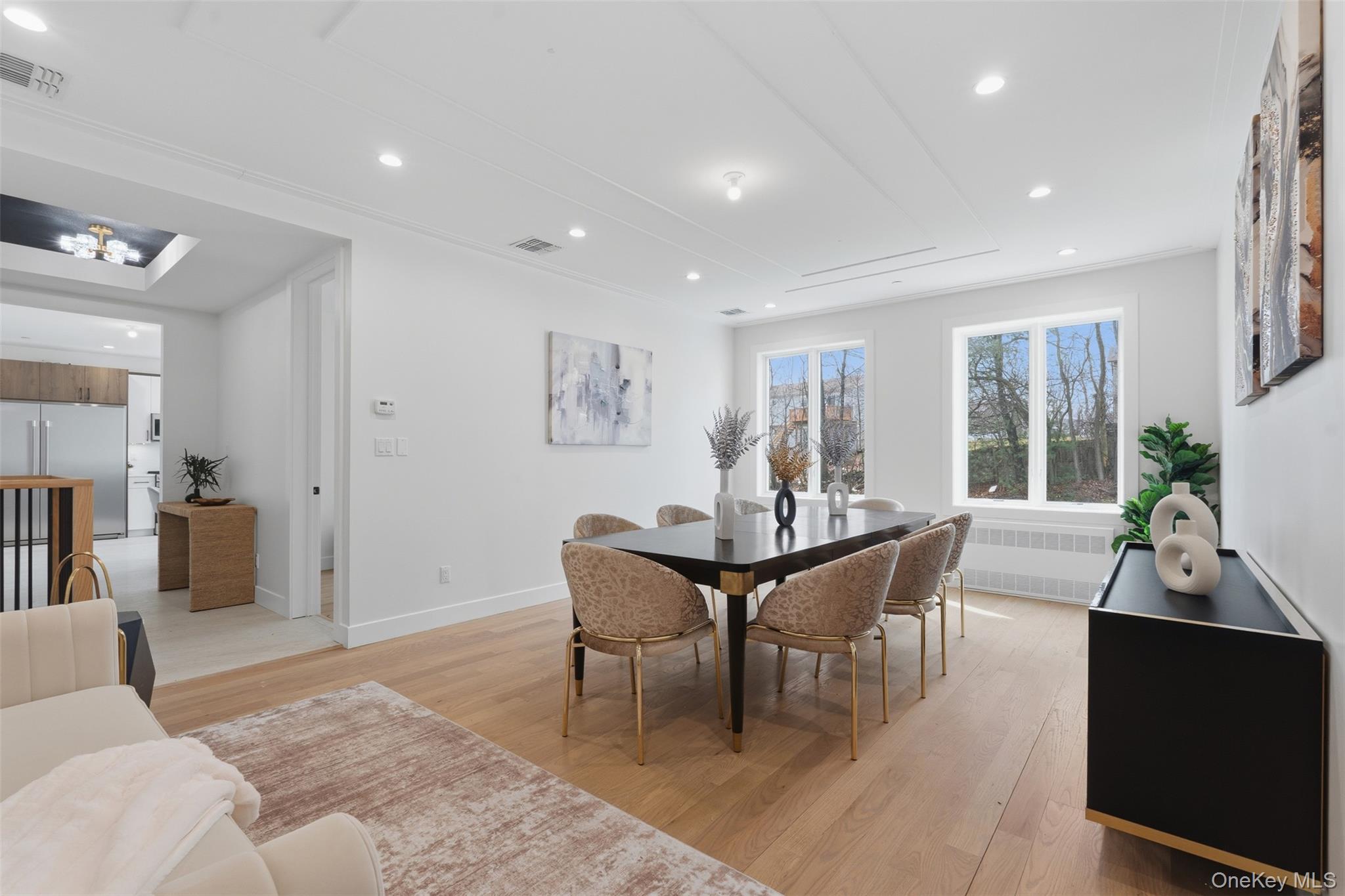 7 Valley Way, Unit 220 Spring Valley, NY 10977 - Photo 17 of 50 a view of a dining room with furniture window and wooden floor