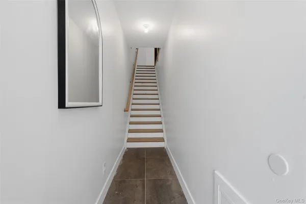 a view of a hallway with entryway