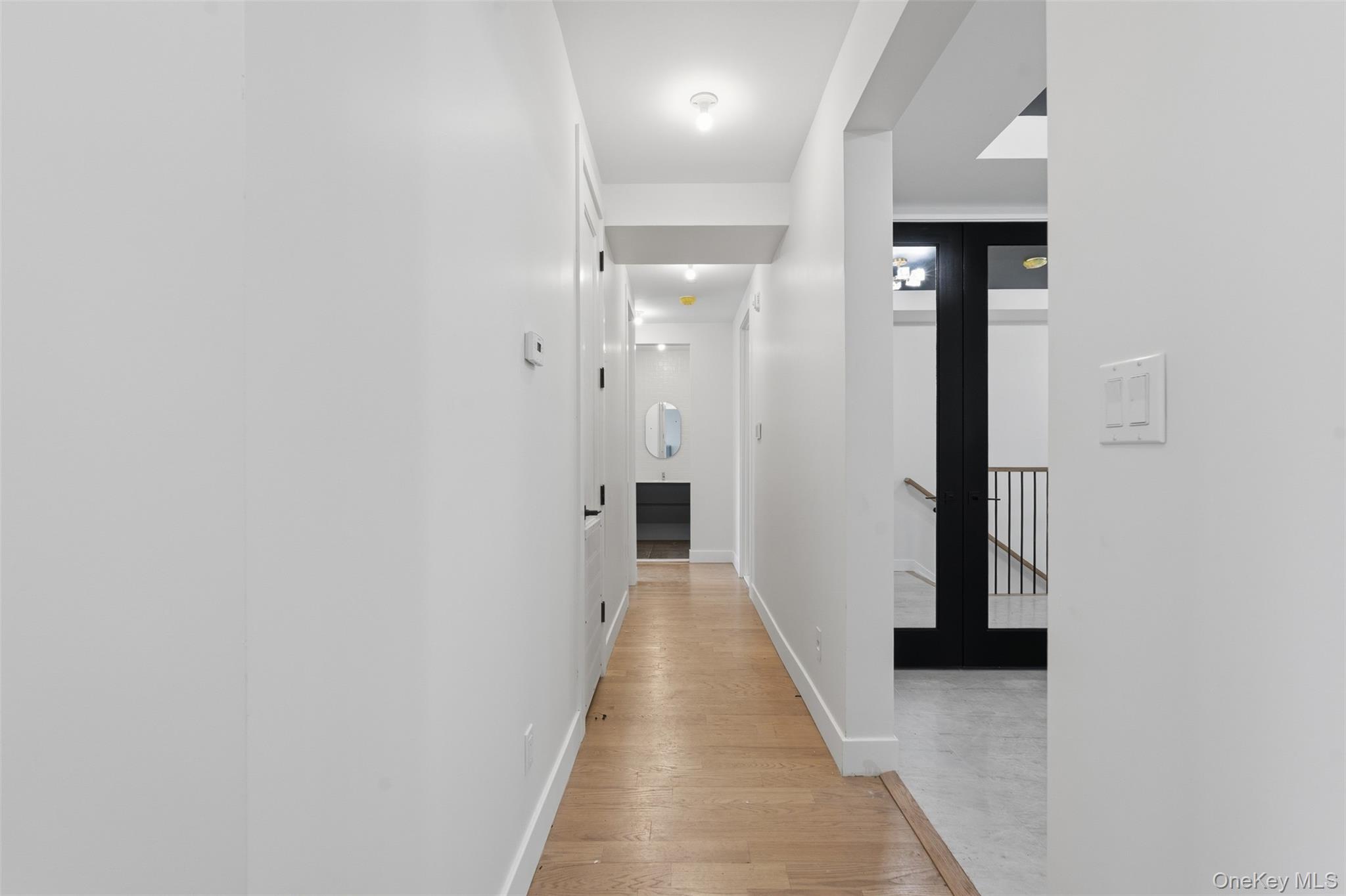 7 Valley Way, Unit 220 Spring Valley, NY 10977 - Photo 32 of 50 a view of a hallway with a white walls