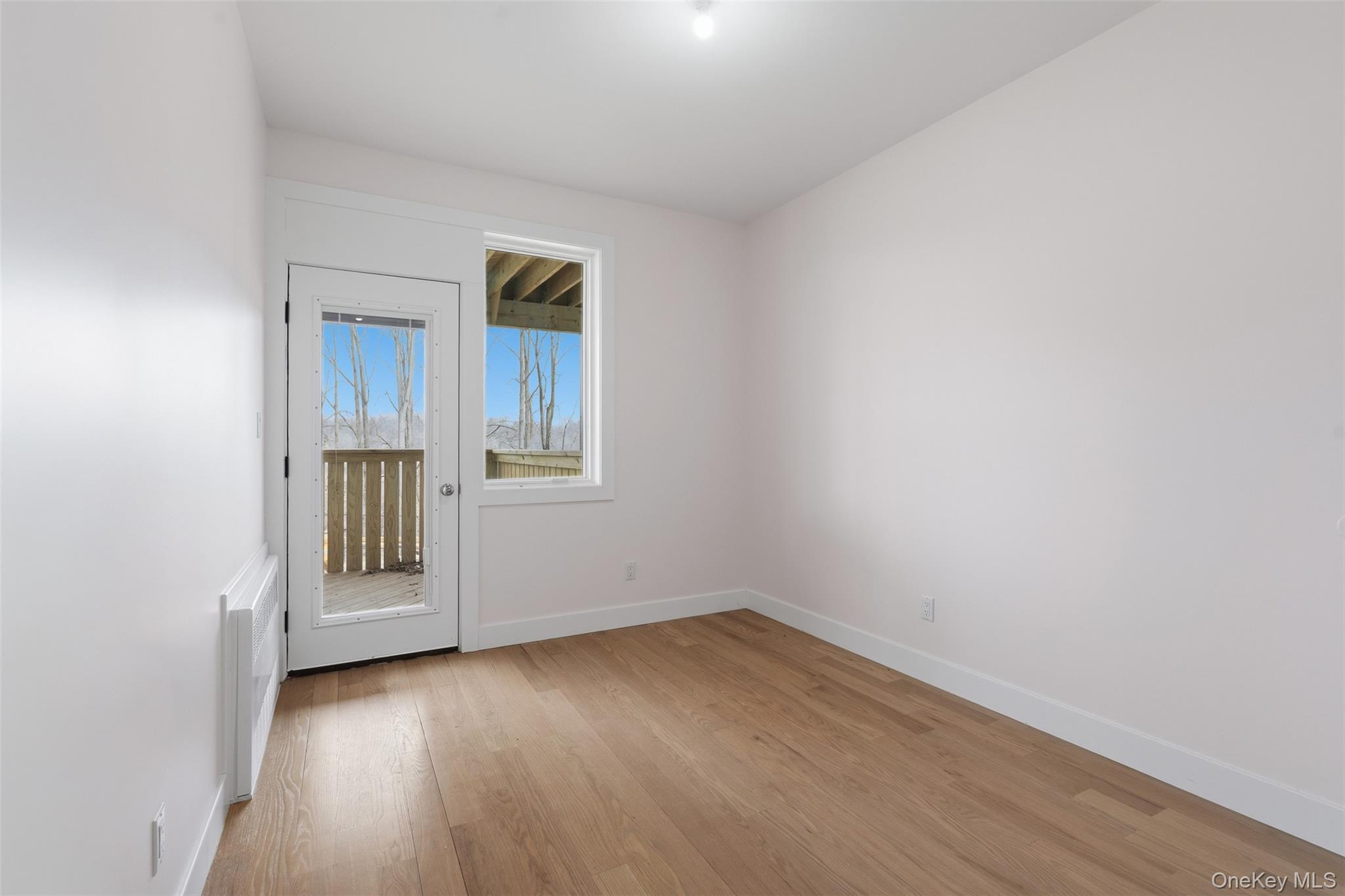 7 Valley Way, Unit 220 Spring Valley, NY 10977 - Photo 33 of 50 wooden floor in an empty room