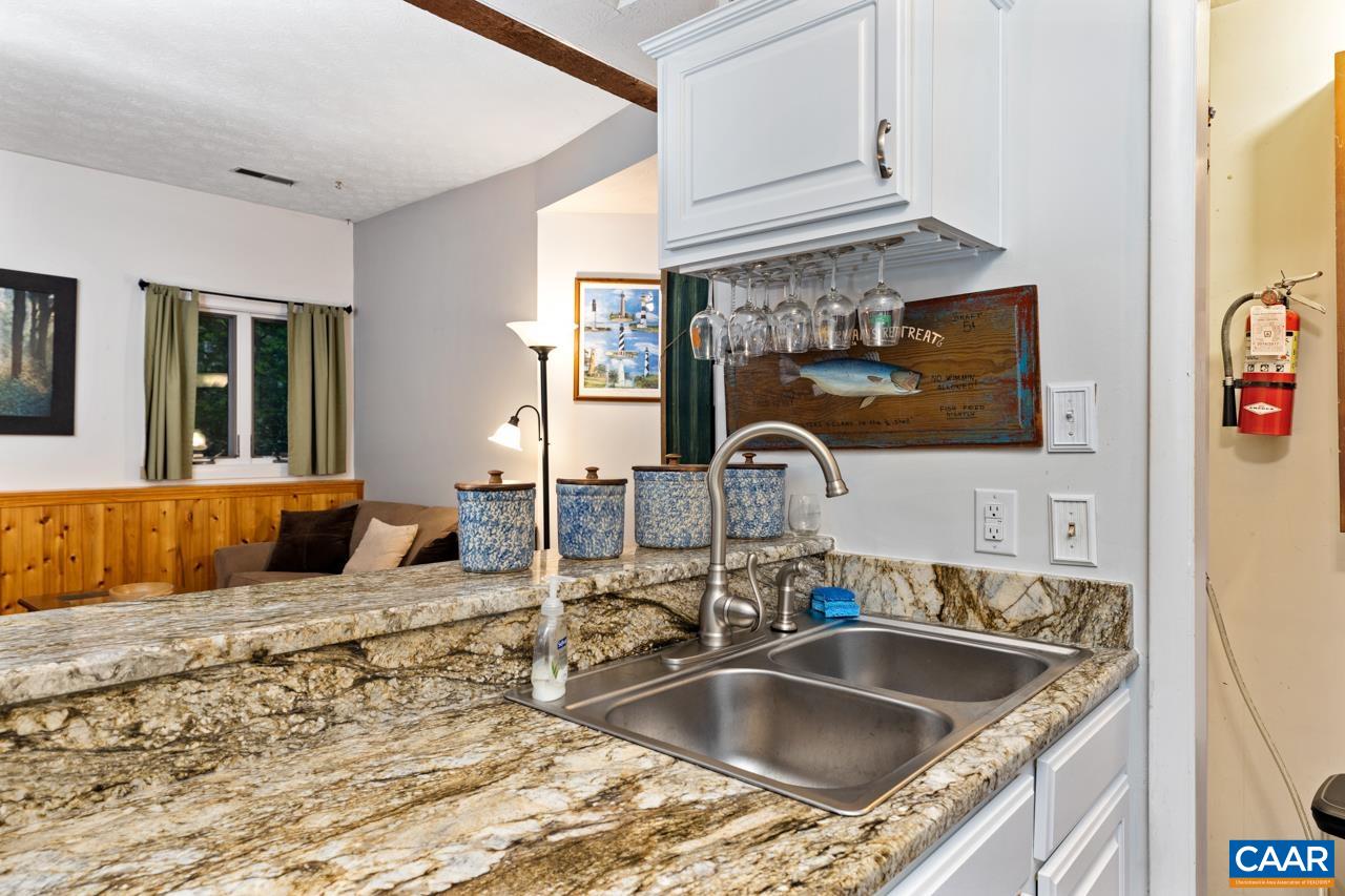 482 3 Ridges Roseland, VA 22967 - Photo 11 of 15 a kitchen with a sink and a refrigerator
