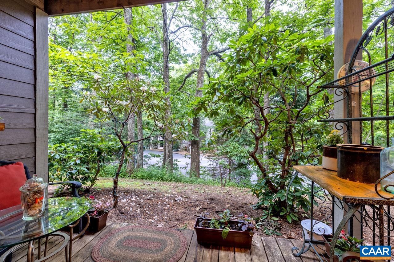 482 3 Ridges Roseland, VA 22967 - Photo 4 of 15 a backyard of a house with table and chairs