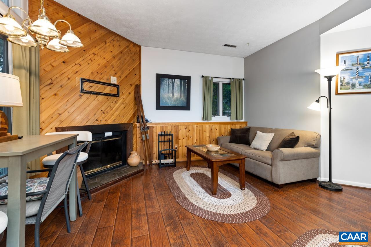 482 3 Ridges Roseland, VA 22967 - Photo 6 of 15 a living room with furniture and a fireplace