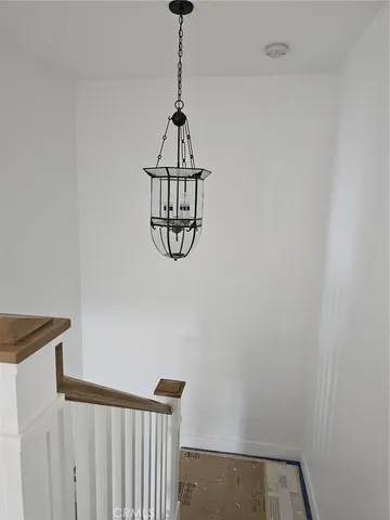 a view of a hallway with a window