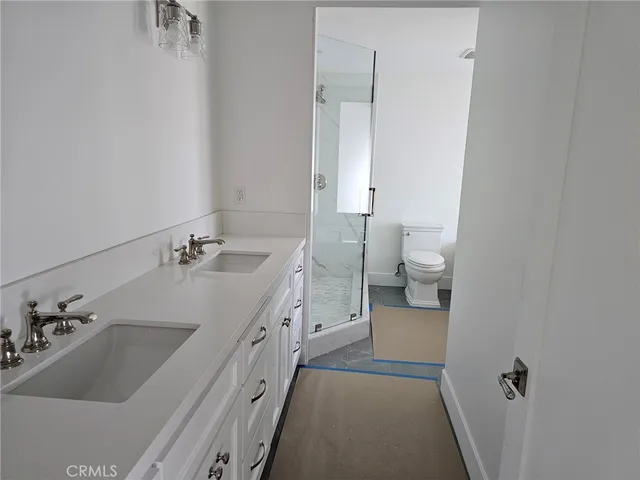 a bathroom with a sink and a toilet