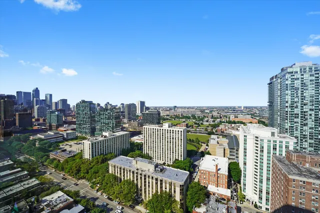 a view of a city with tall buildings