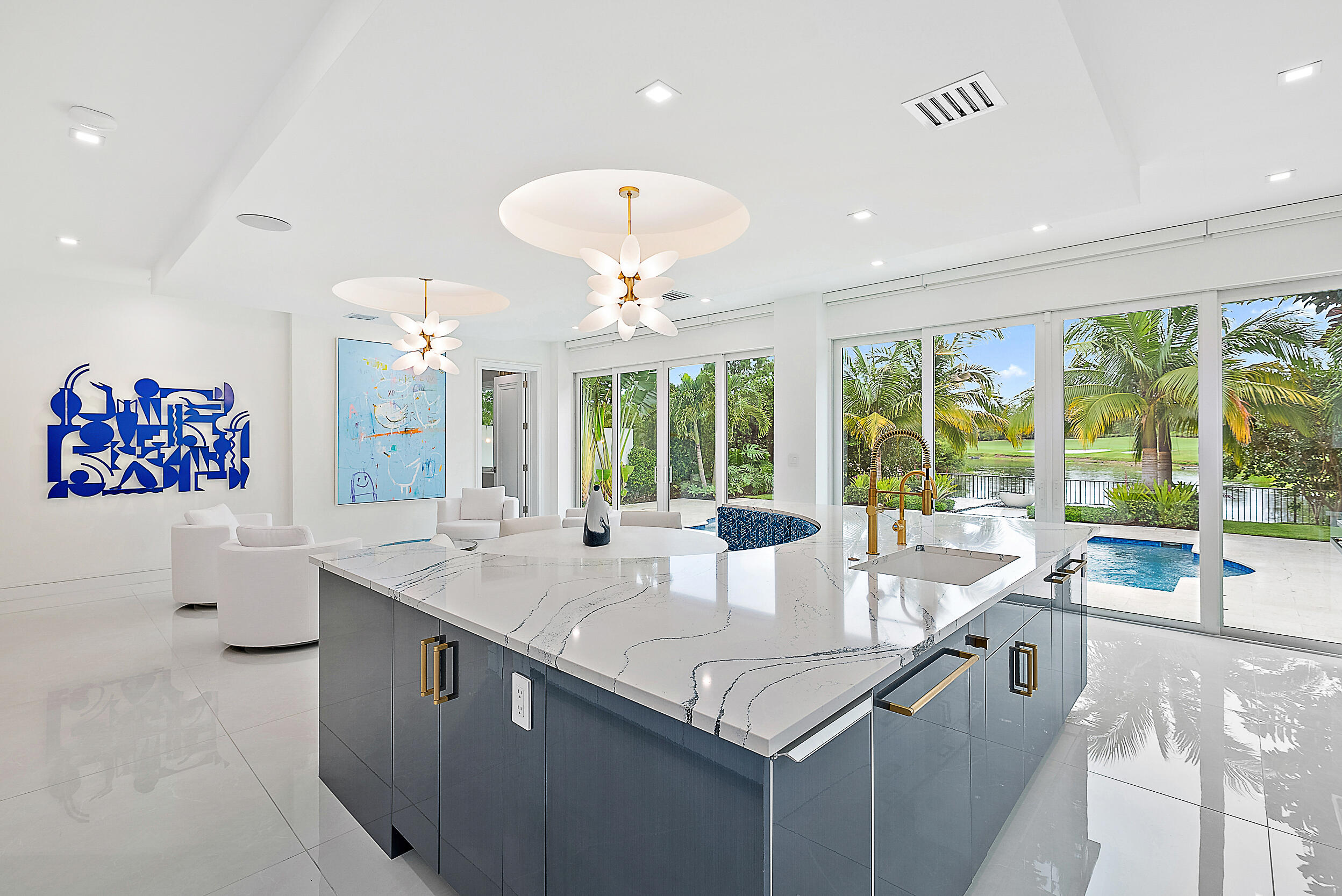 134 Golf Village Boulevard Jupiter, FL 33458 - Photo 14 of 48 a dining hall with stainless steel appliances granite countertop a sink and a large window