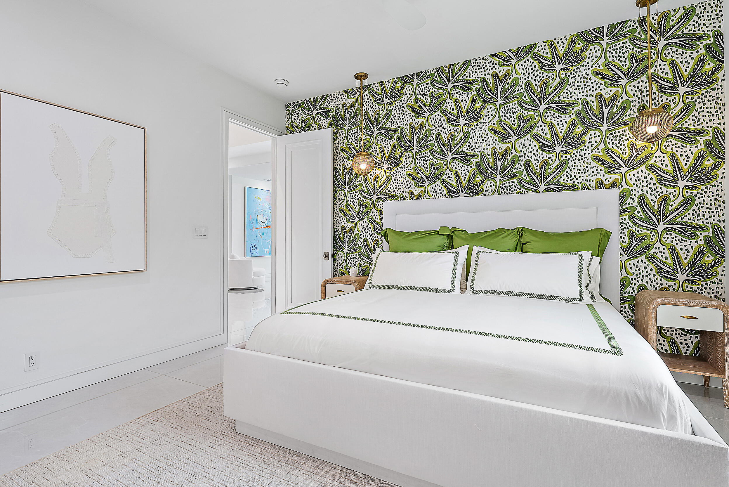 134 Golf Village Boulevard Jupiter, FL 33458 - Photo 23 of 48 a bedroom with a bed and a chair