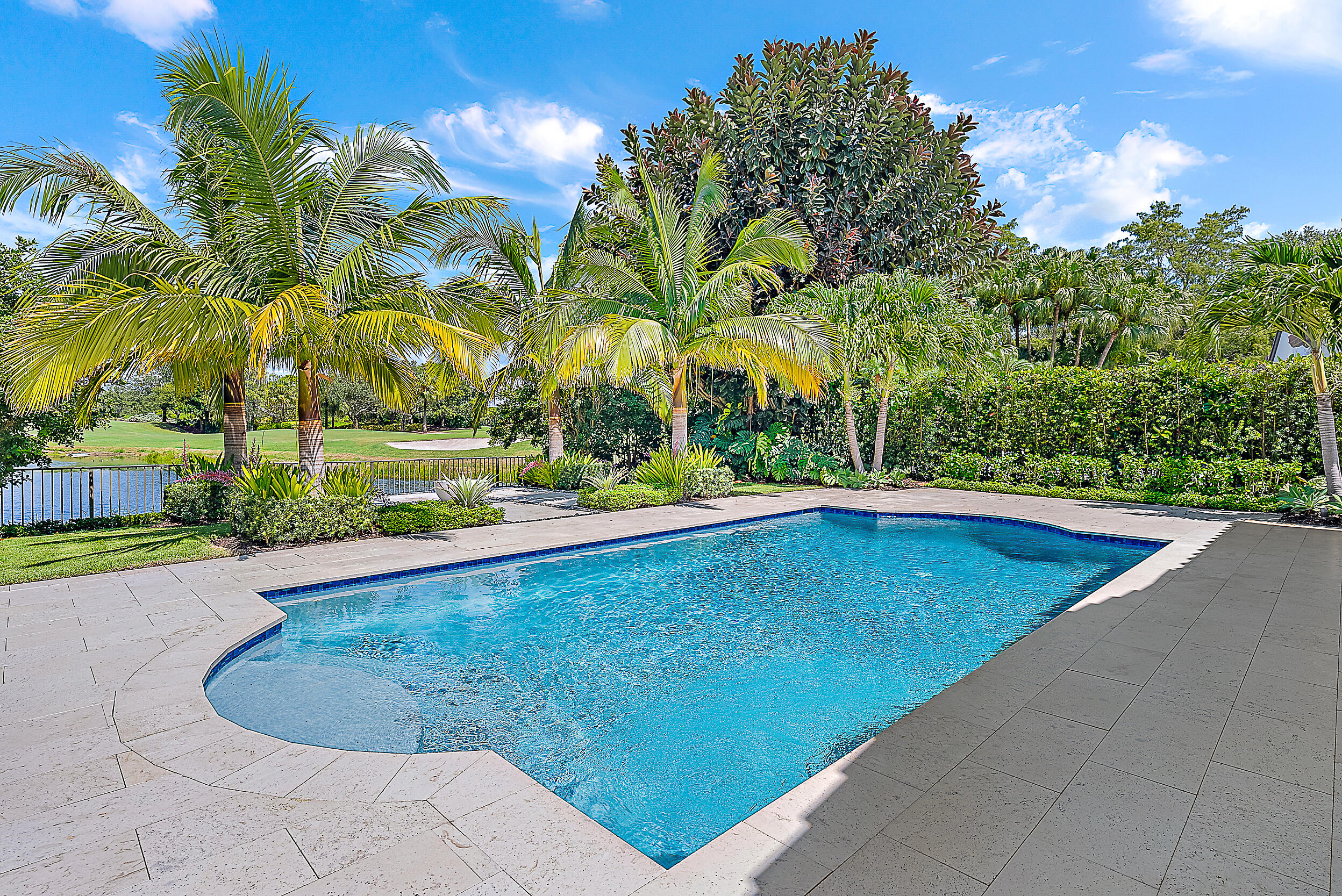 134 Golf Village Boulevard Jupiter, FL 33458 - Photo 27 of 48 a view of outdoor space and swimming pool