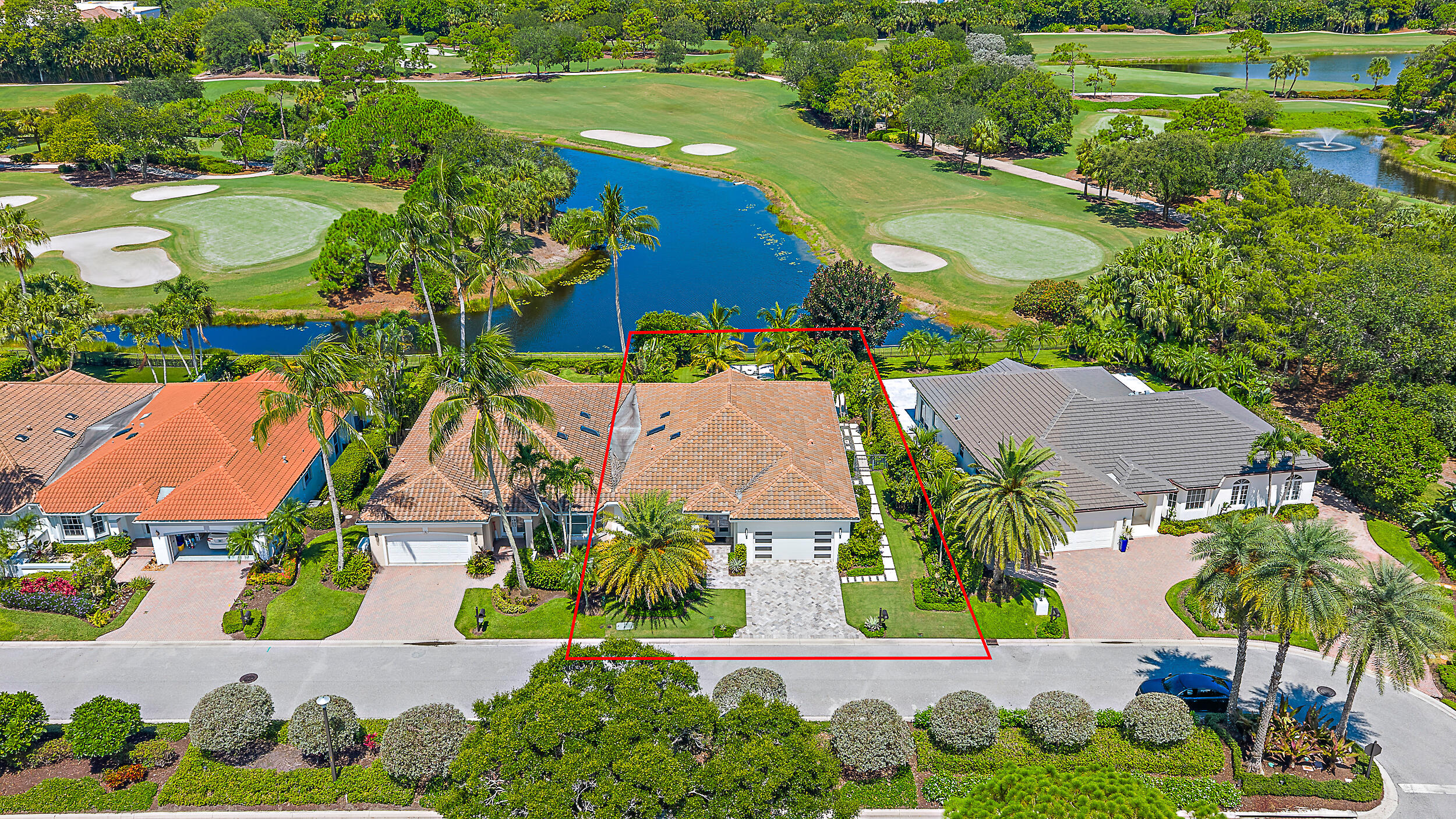 134 Golf Village Boulevard Jupiter, FL 33458 - Photo 29 of 48 an aerial view of residential houses with outdoor space and swimming pool